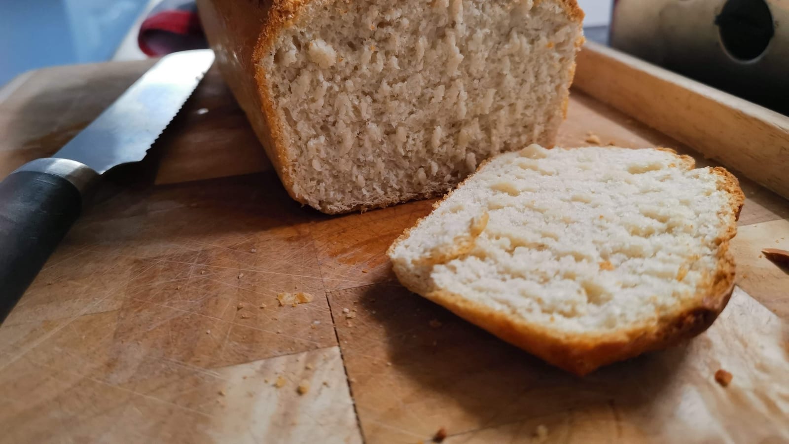 Cut sourdough loaf showing crumb and crust